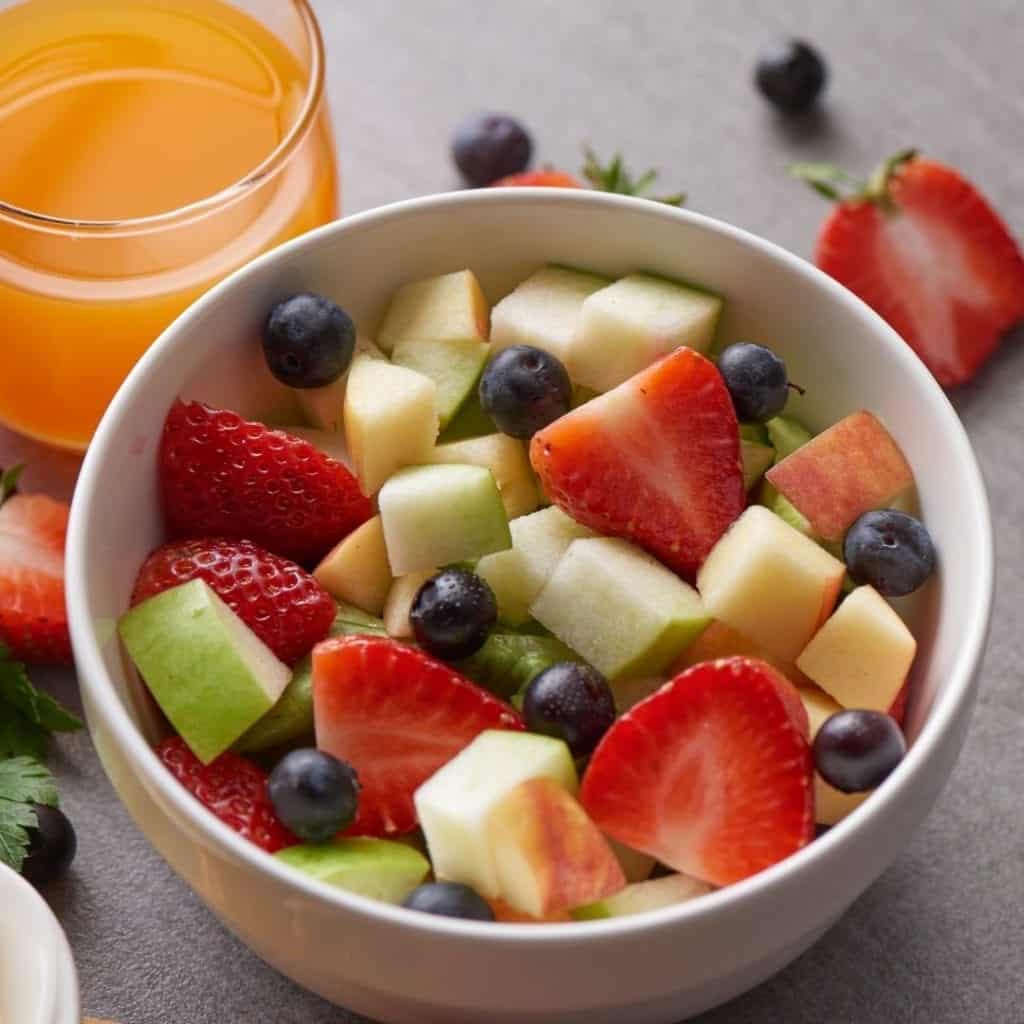 White bowl filled with 10 fruits, antioxidant rich foods. Fruits rich in vitamins and antioxidants.