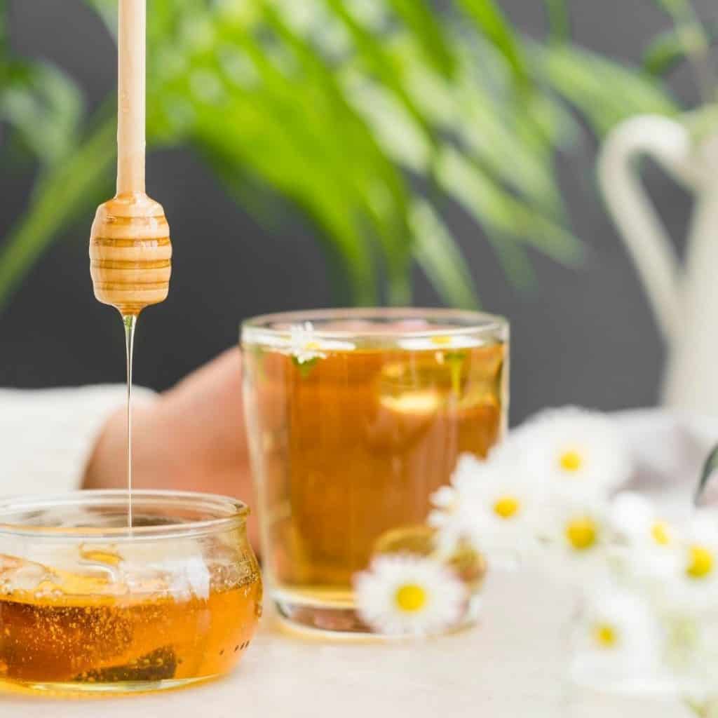 Does manuka honey boost your immune system? Manuka honey in a glass container. 