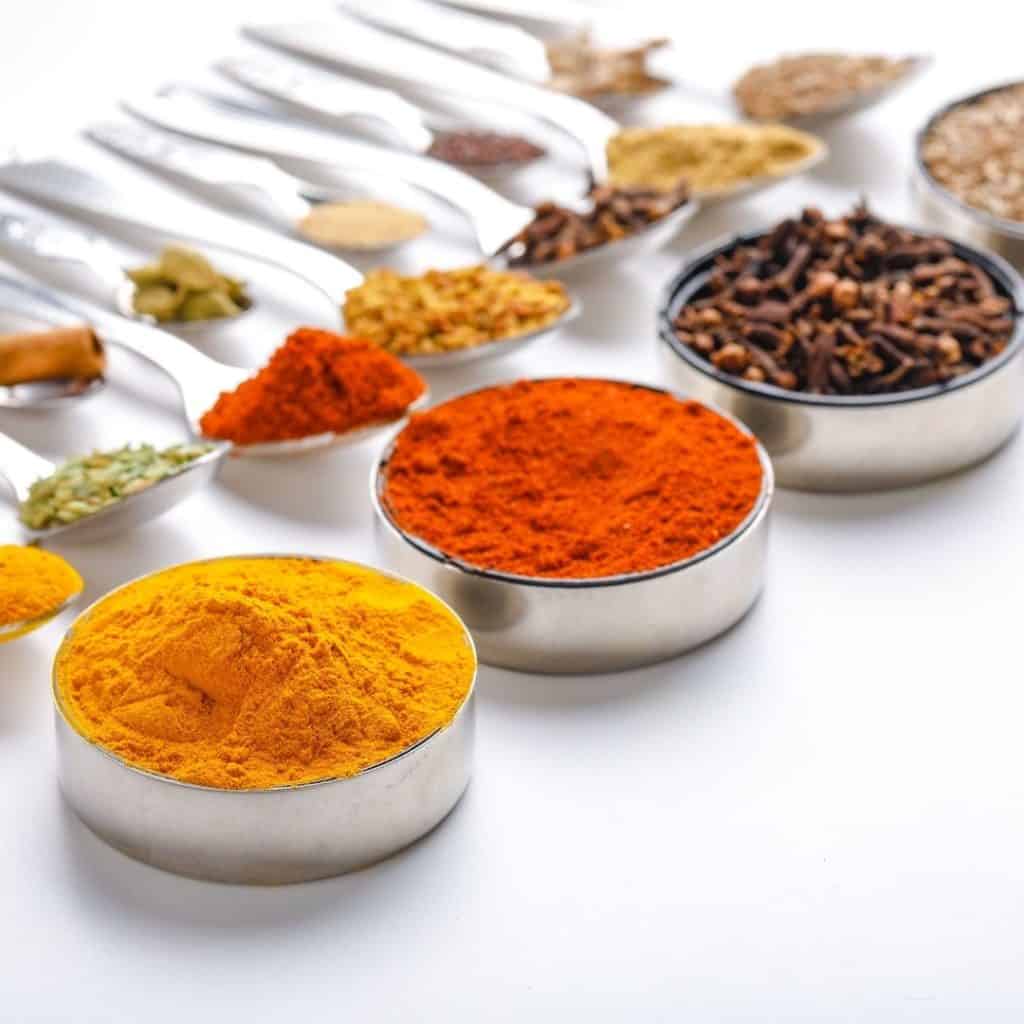 Spices to naturally boost your metabolism, like cinnamon, cardamon, cayenne pepper, and ginger.
