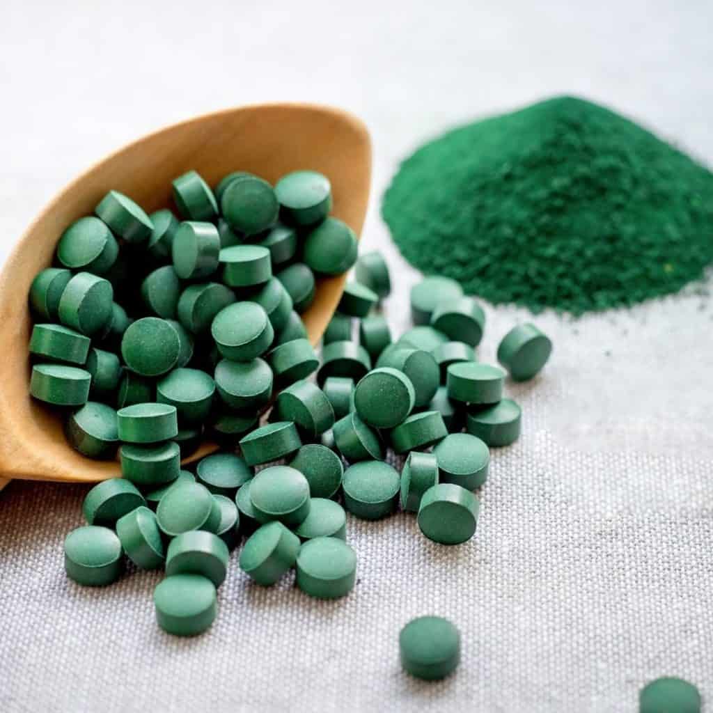Spirulina tablets and powder, powerful antioxidant for the body.