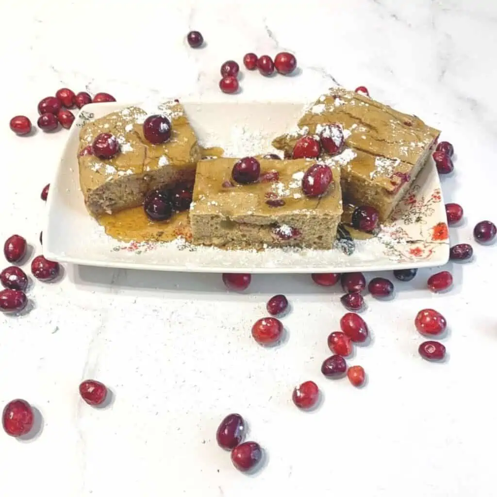 Cranberry sheet pan protein pancakes made with pumpkin.