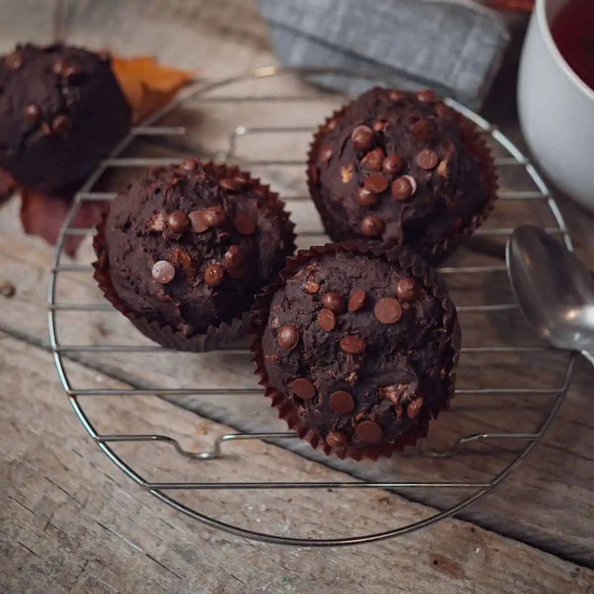 Easy to make gluten free chocolate muffins on a wire rack to cool.