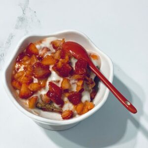 Homemade strawberry shortcake made with gluten free ingredients in a white dish.