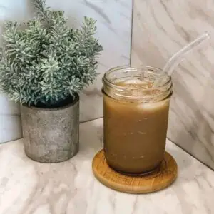 Homemade Starbucks brown sugar oat milk shaken espresso recipe in a mason jar.