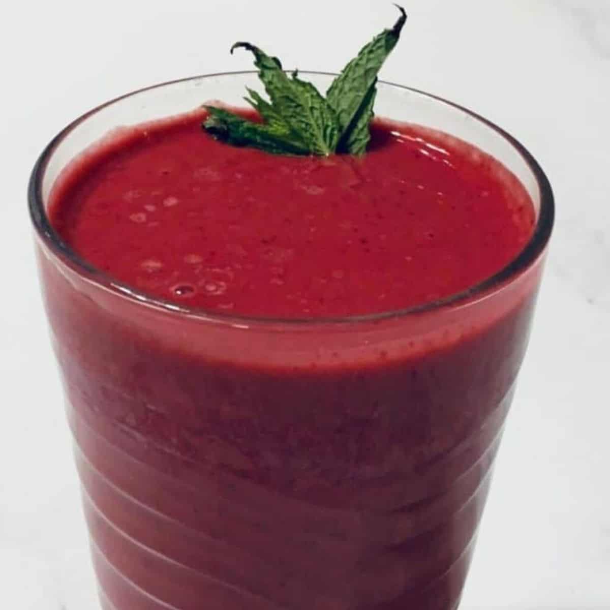 Vibrant red berry drink.