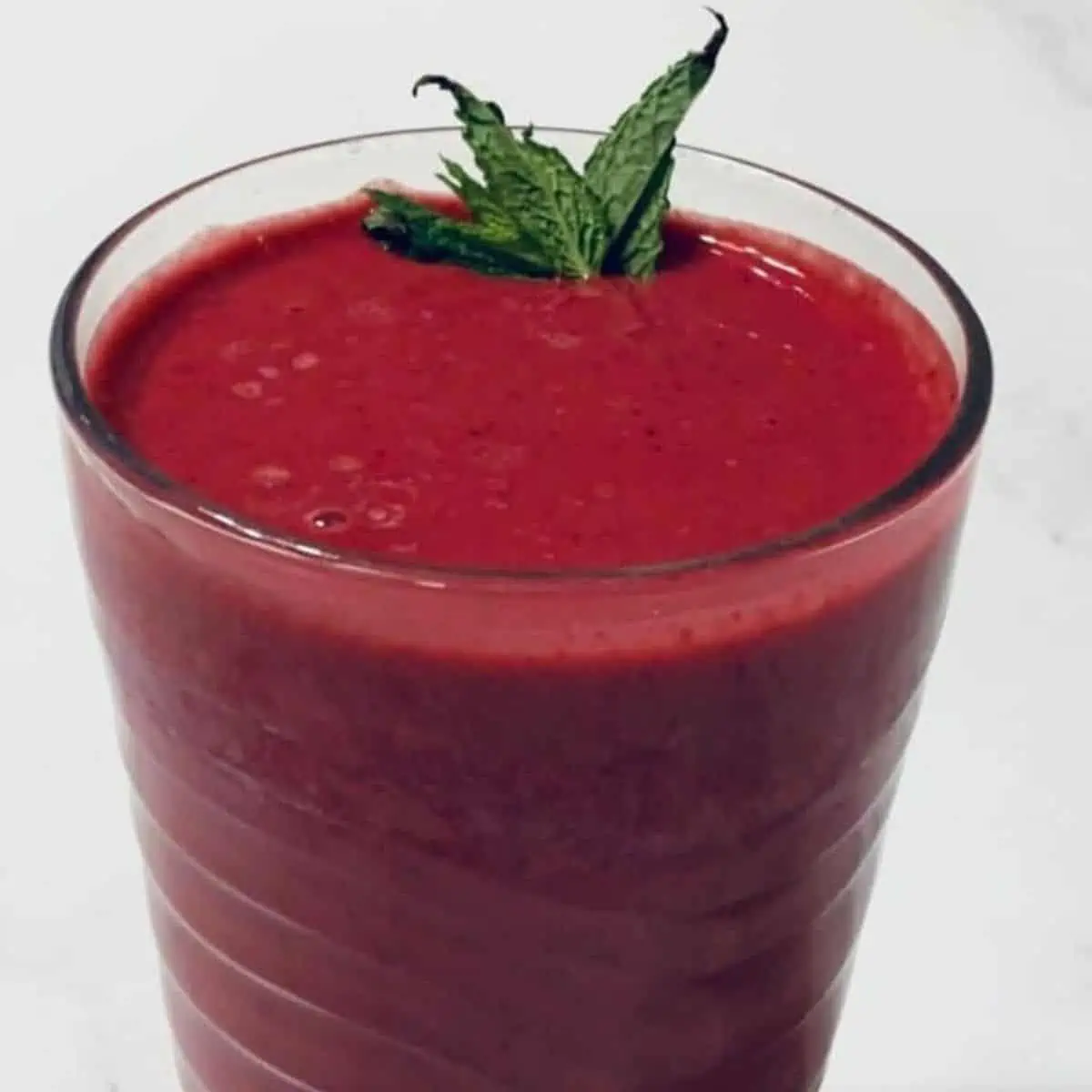 Vibrant red berry drink.