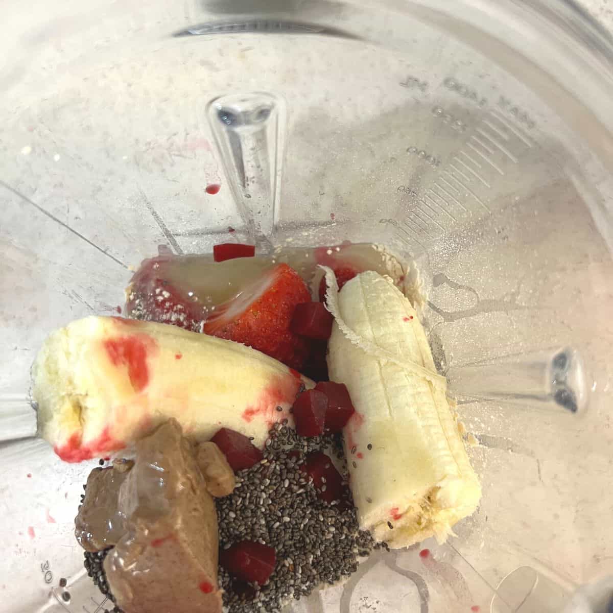 Strawberry pancake ingredients in blender