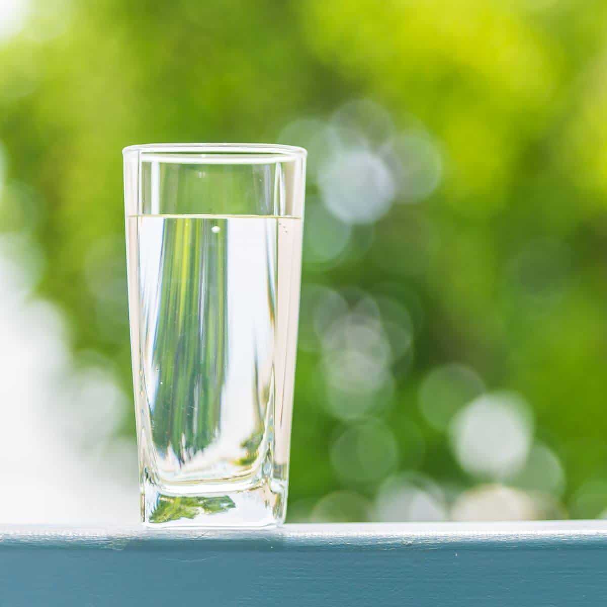 Water in a glass by the sun.