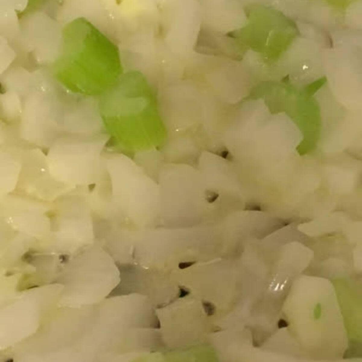 Cook the onions and celery until soft.