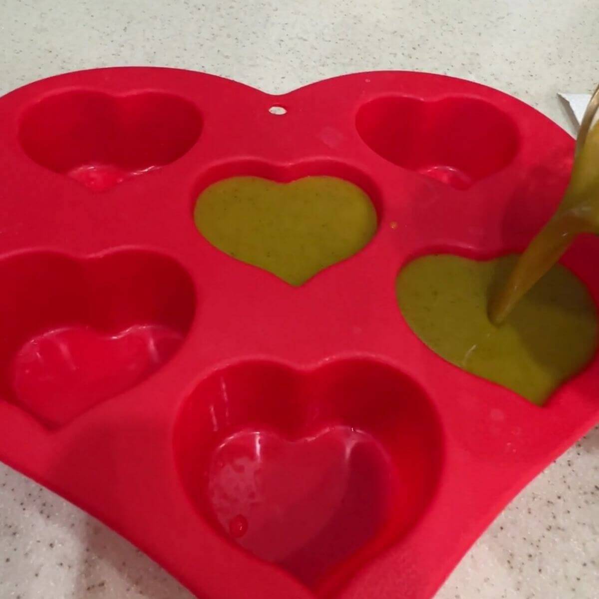 Pour the mixture into either a 9" X 6" pyrex dish or silicone molds. Refrigerate for 2 hours or until firm.