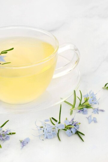Drinking tea with herbs that are good for your health and digestion.