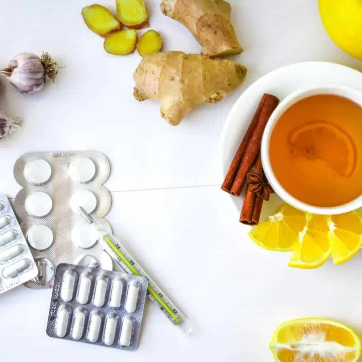 Easy dietary changes to help treat common head cold naturally with garlic, avoid dairy, add in ginger, cinnamon, and honey tea drink.