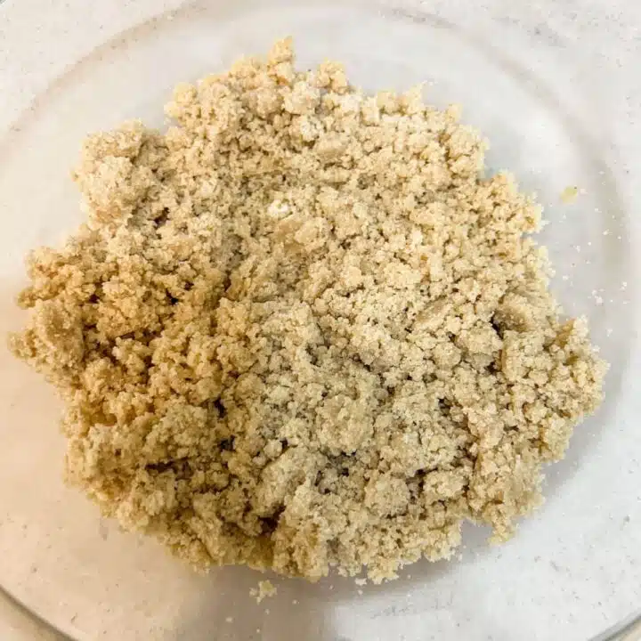 combine ingredients to make vegan pecan pie bars, crumbly consistency.