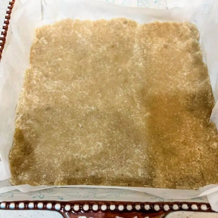 Spread the shortbread crust into bottom of pan.