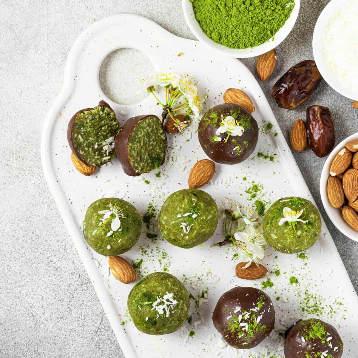 matcha energy bites balls in chocolate glaze.