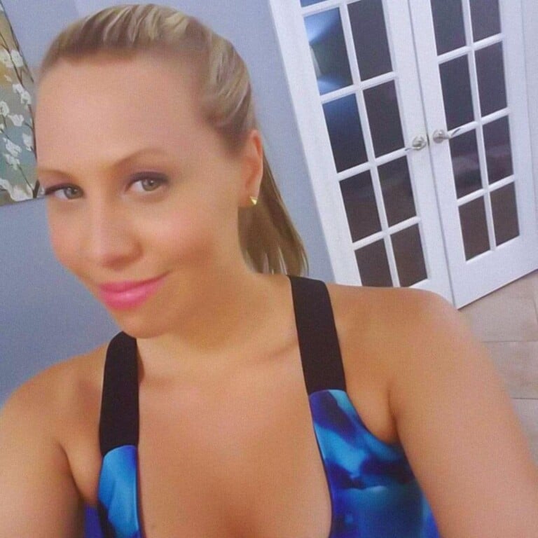 Laura Ann Villanueva smiling after a workout